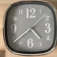 Orologio da parete con cornice in metallo