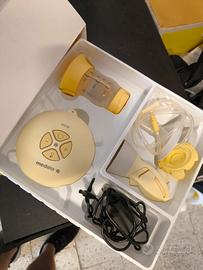 Tiralatte con accessori Medela