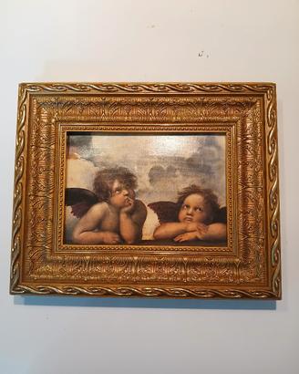 Quadro con cornice dorata 