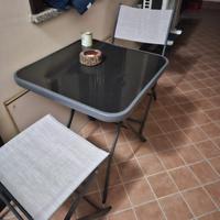 Tavolino in vetro con sedie