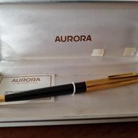 Penna Aurora laminata oro, nuova, da 250 a 65 euro