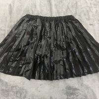 Minigonna  plissettata nera lucida