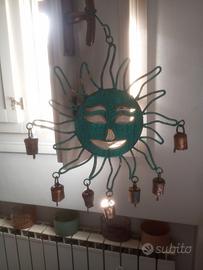 sole con campane per vento 