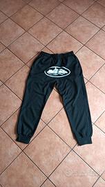 pantaloni corteiz neri e binachi