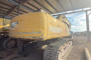 Escavatore cat  New Holland 385