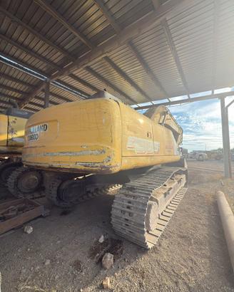 Escavatore cat  New Holland 385