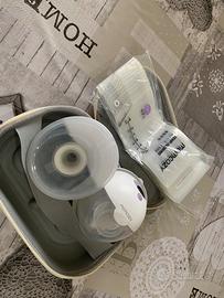 Tiralatte momcozy m5