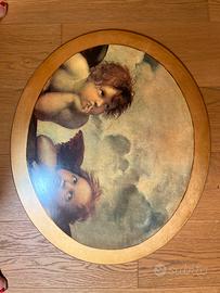 Quadro ovale con gli angeli di Raffaello