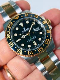 Rolex Gmt acciaio e oro 116713LN 2015 full Service