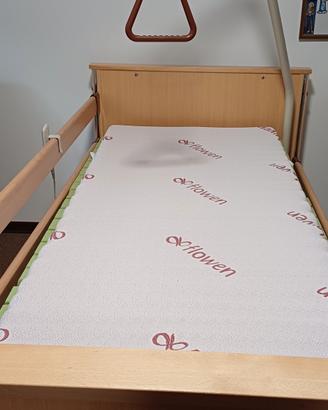 Letto con sponde motorizzato