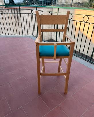 Seggiolone bimbo e gioco primi passi