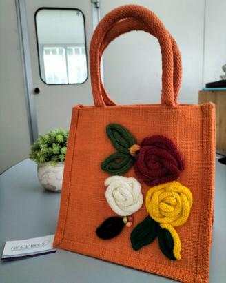 Borsa in iuta arancione NUOVA con fiori applicati
