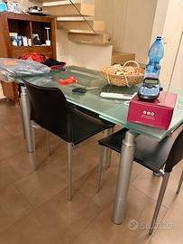 Tavolo in vetro allungabile