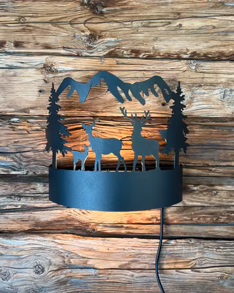 Lampade applique stile alpino cervi e montagne
