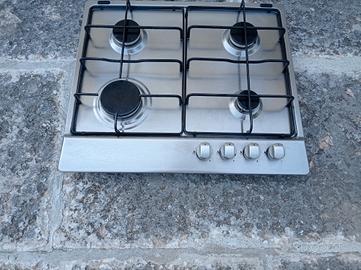 Piano cottura usato  a gas a quattro fuochi