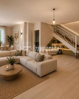 Elegante porzione di bifamiliare completamente ris