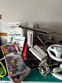 Nintendo Wii Bianca + accessori + volante + giochi