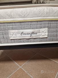 mezzo letto con doghe in legno  e materasso emifle