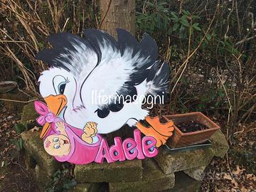 Cicogna in legno per festa nascita