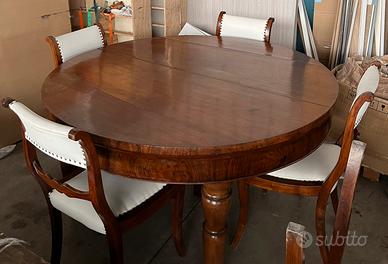 Tavolo rotondo in legno con 6 sedie