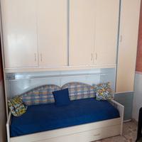 armadio a ponte con due letti 