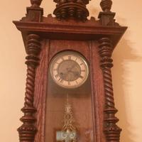 Orologio a pendolo da muro