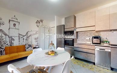 TRILOCALE CON DOPPI SERVIZI, GARAGE E TERRAZZO