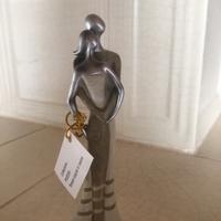 Scultura in resina tenera coppia