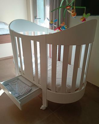 culla ovale in legno con accessori