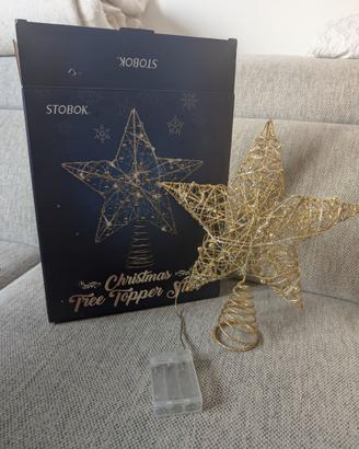 Stella di Natale con luci e perline