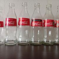 5 bottiglie di coca cola diverse+ 1 croazia vuote