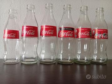 5 bottiglie di coca cola diverse+ 1 croazia vuote