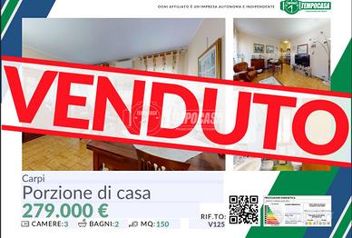Villa a schiera di testa con garage triplo