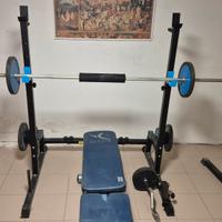 half rack parallele e pesi per home gym