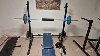 half rack parallele e pesi per home gym