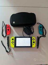 Nintendo Switch+4 Joy-con+Sd 128GB+Custodia+Gioco