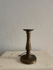 Antico candeliere in bronzo