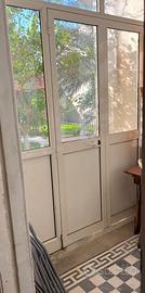 Vetrata in alluminio con porta
