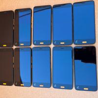 Lotto di 10 telefoni Android + supporti dock