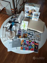 Console Wii, pedana, tappetino e giochi 