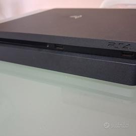  PS4 SLIM +CUFFIE joystick e 2 giochi 