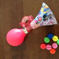 Trombetta e palline colorate per raggi bici