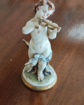 Statua Capodimonte bambino con violino