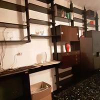 Libreria terra cielo in mogano