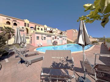 Villetta a schiera in condominio con piscina