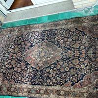 Antico tappeto persiano annodato a mano