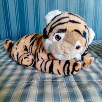 Tigrotto di peluche marca Trudi,colore arancio  e