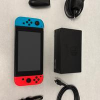 Nintendo Switch (modello 2021) + 3 giochi + baule