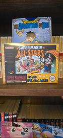 super Mario all-stars e Mario world snes