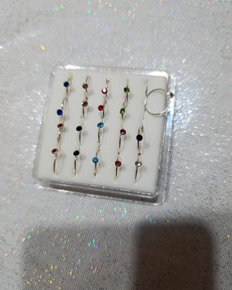 Set da 19 Piercing naso o orecchie vari colori cer
